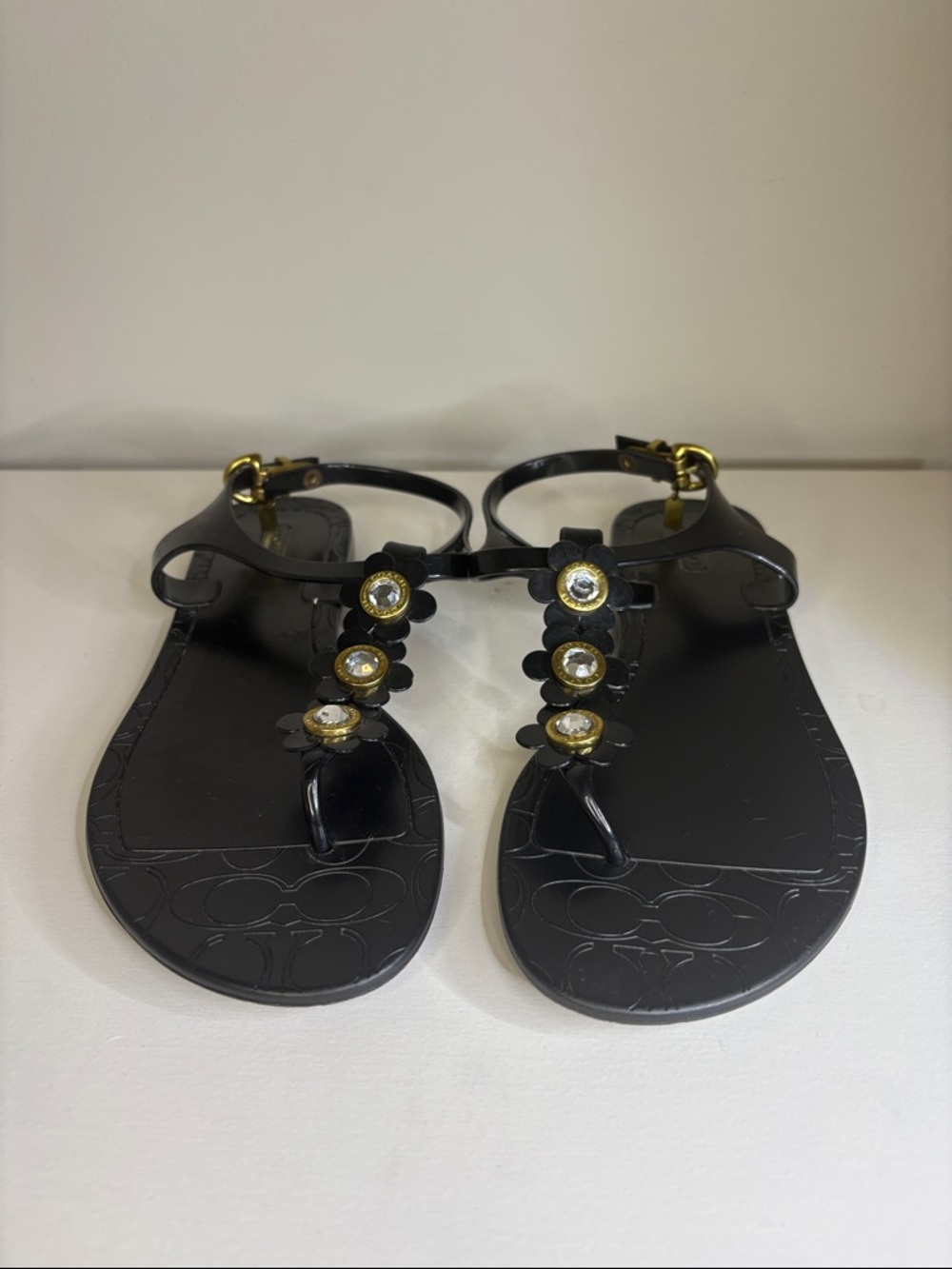 Coach Black Jelly Floral T-Strap Sandals with Gold Accents